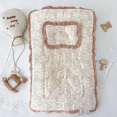Padded baby floor mat with pillow, squirrel and bunny print