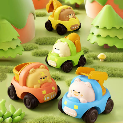 Animal pull-back cars among toy trees