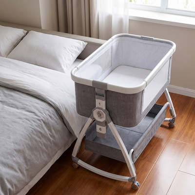 Bedside Baby Crib, placed beside a neatly made adult bed in a calm bedroom, empty crib with a fitted sheet only
