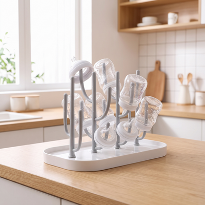 Baby Bottle Drying Rack, on a kitchen counter holding drying baby bottles