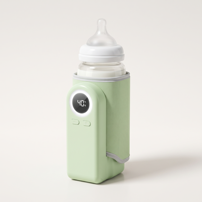 Portable bottle warmer, Green, with a baby bottle