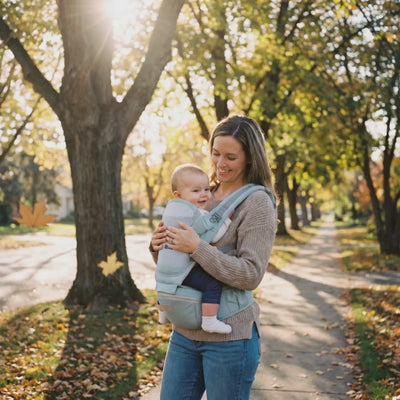 Walking with baby in the hip-seat carrier